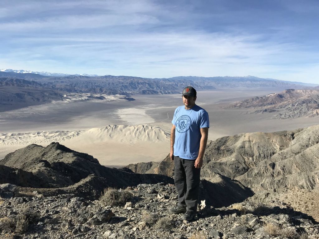 Three pictures of us on the summit of P6980 with the best view behind us: