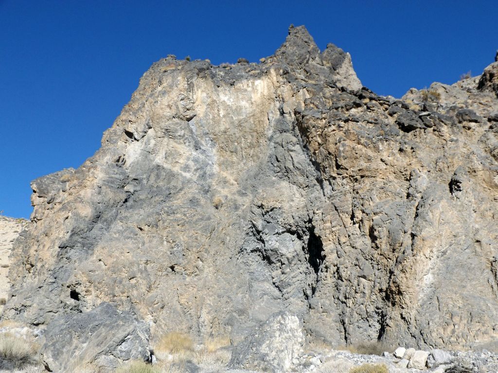A very impressive towering canyon wall that is also quite colorful: