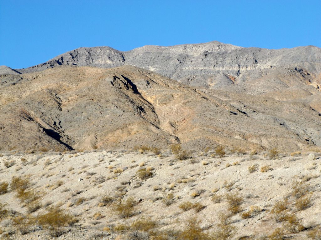 Peak 6980 (or P6980) was clearly visible high above us and far in the distance.  It is the left summit: