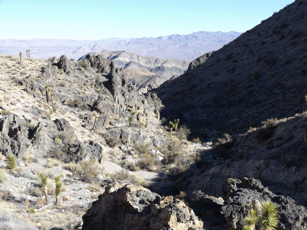 From the gully, we got on the hillside and looked back before starting our climb: