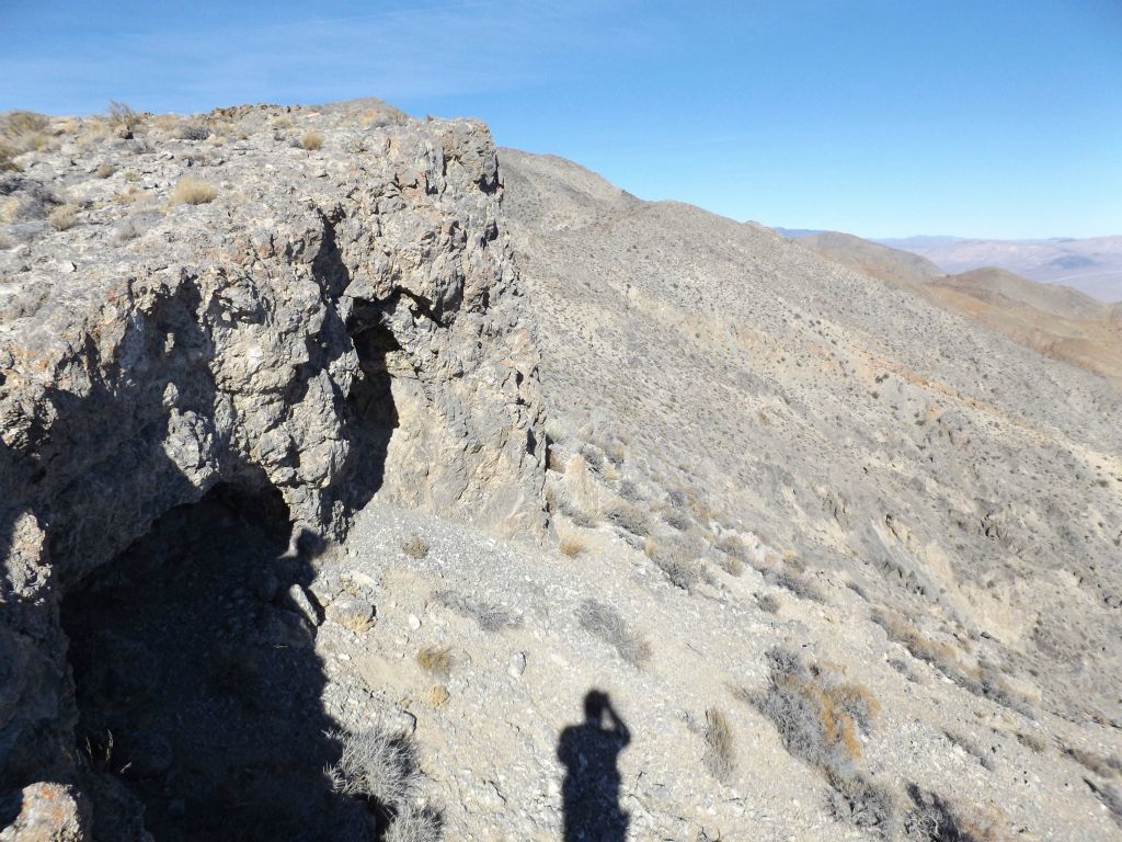 I always try to stay near the highest point of the ridge, depending on terrain and any obstacles faced.  Notice how the right side of the ridgeline gives way to cliffs here: