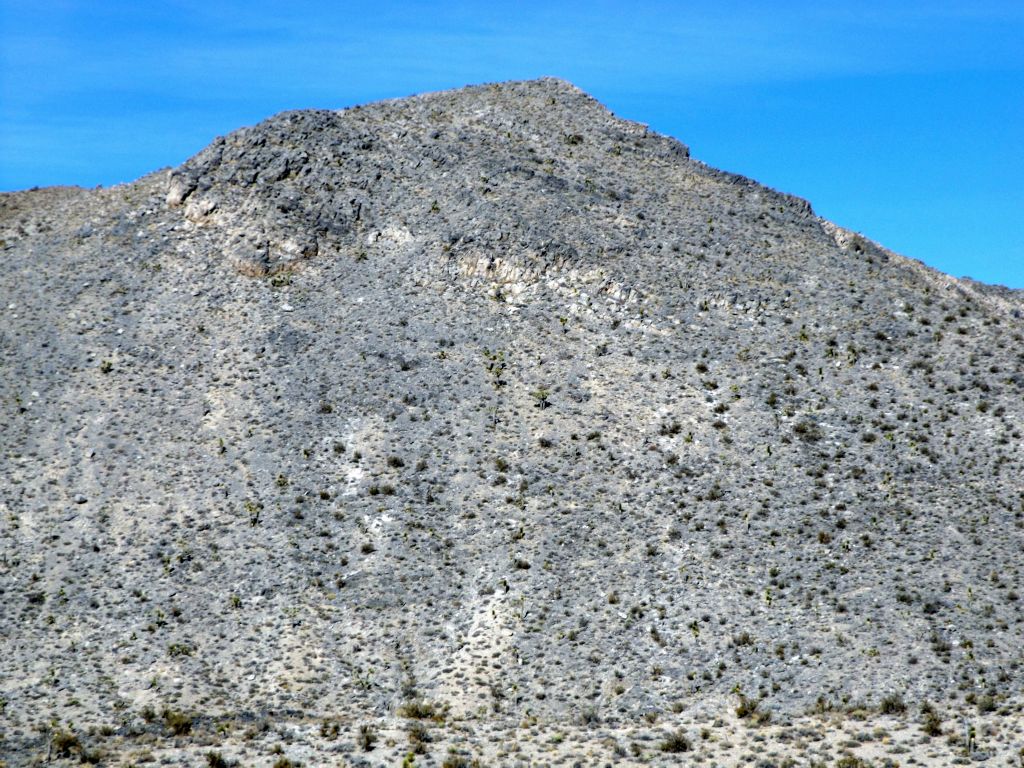 The mountain block of P6980 has some very steep cliffs on the south side.  We planned to circle around and climb it from the right: