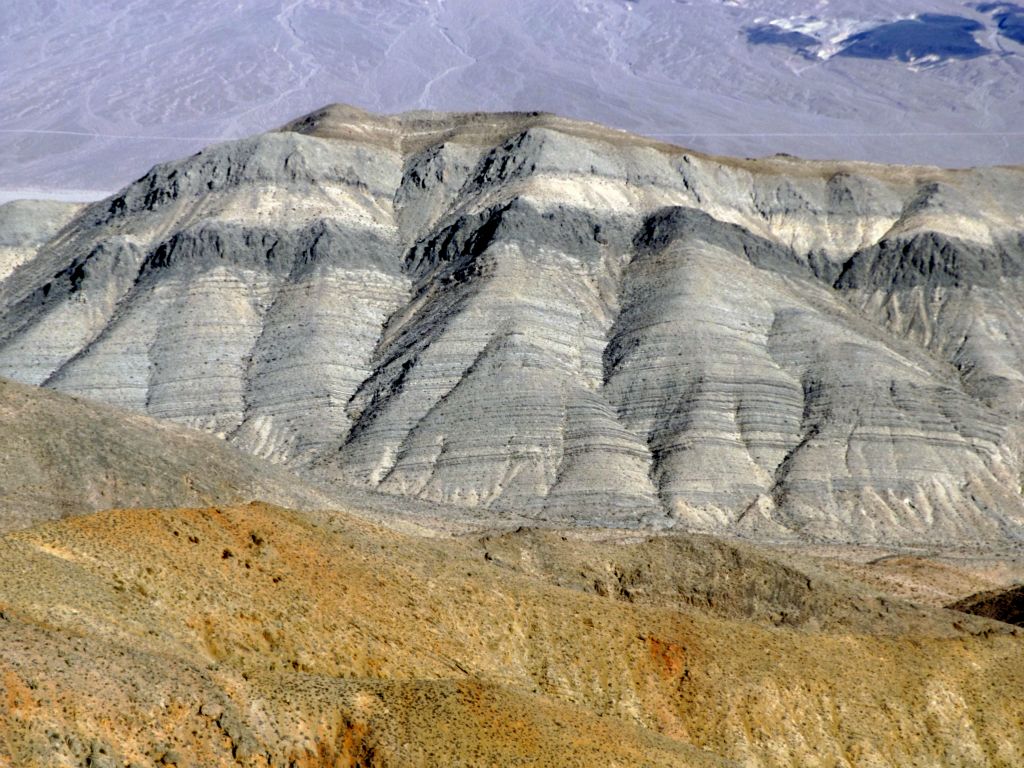 This particular smaller mountain, which we got photos of several times earlier in this report, stood out the most from the summit: