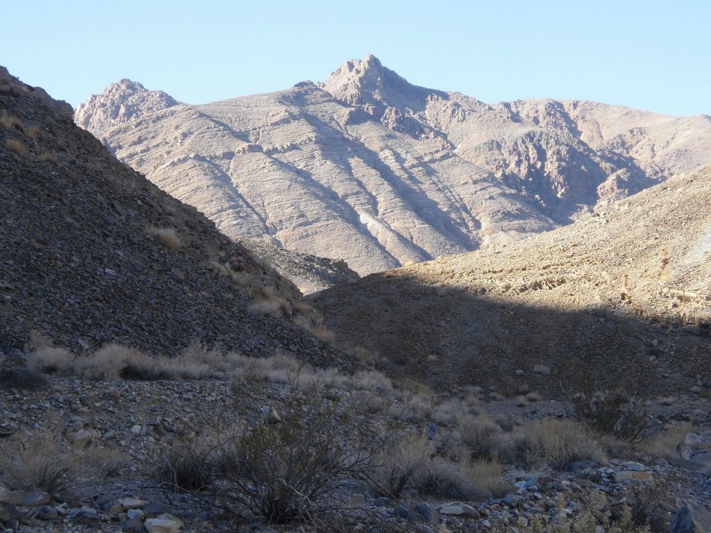 Although these two high triangular peaks stand out when viewed from the canyon, neither peak is Cameo BM or Warm BM.  Warm BM is actually located at the rounded hillside bump seen on the top right side of the picture: