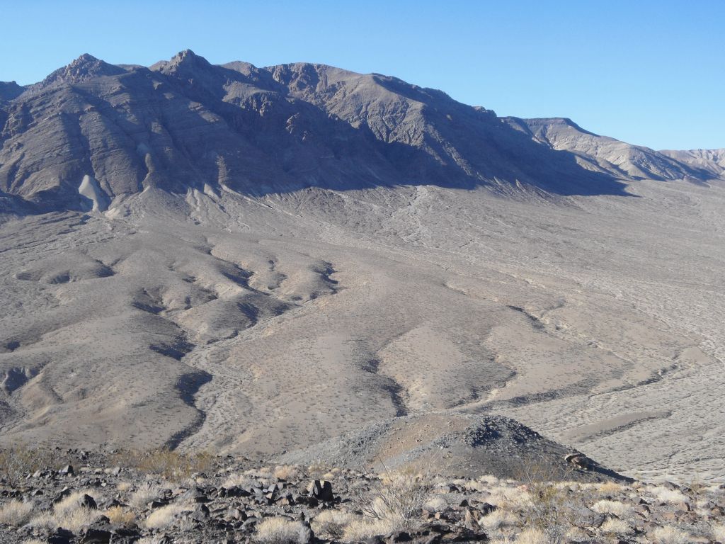 The summit of Warm BM is hidden slightly behind the high rounded bump seen in the center of this picture: