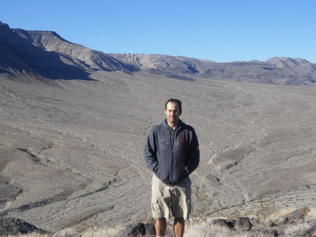 Steve getting his picture with Round Valley in the background after reaching the summit: