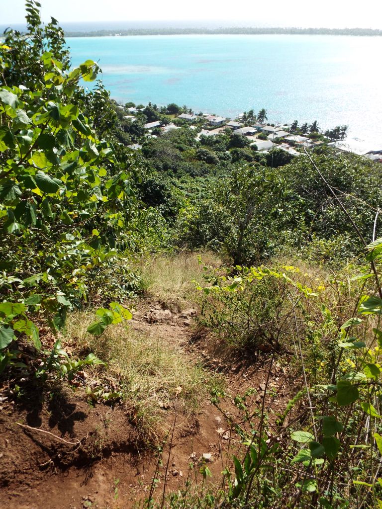The hiking route trends southwest as it climbs out of the village: