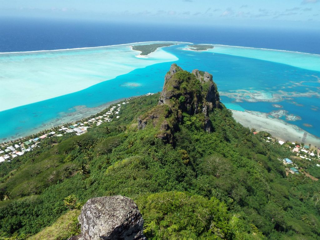 Looking due south, this is the classic summit view from the top of Maupiti.  Onoiau Pass cuts in between Motu Tiapaa (left) and Motu Pitiahe (right):