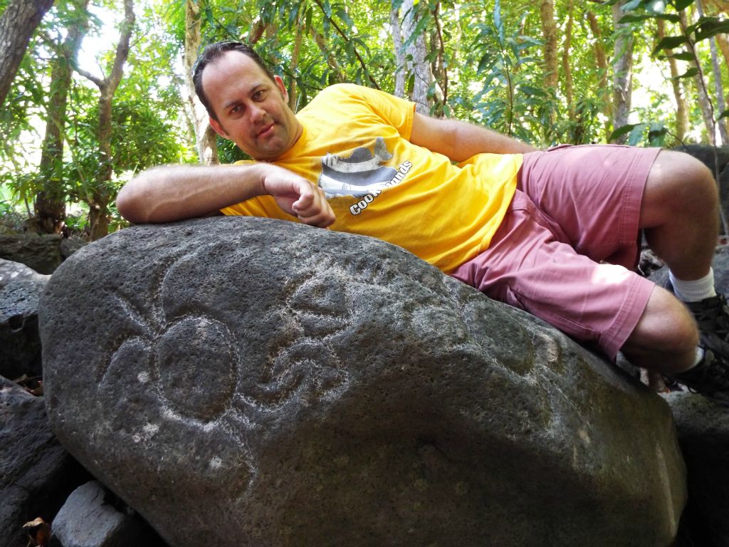 Getting a picture with one of the petroglyph boulders:
