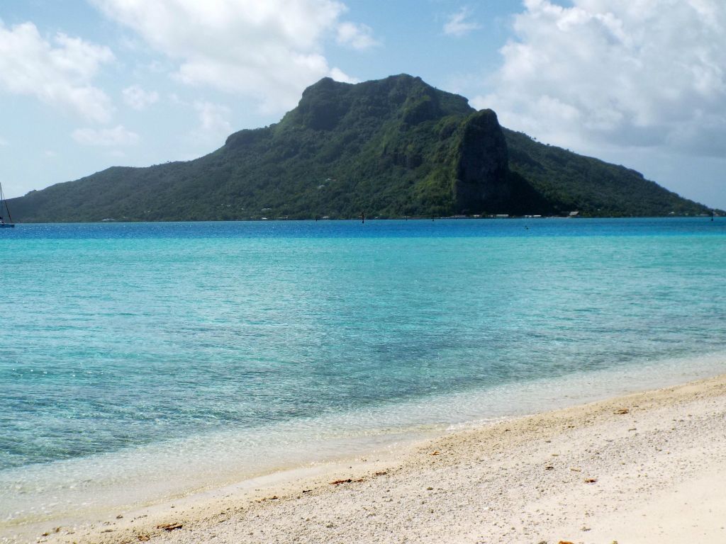 This was the view promised earlier (on the picture where I had zoomed in on a beach from the summit).  This is taken from Motu Pitiahe.  This is an excellent look at the face of Mt. Hotu Paraoa: