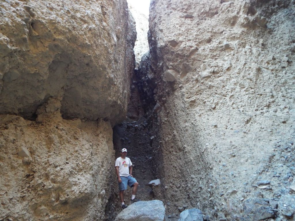 A picture of Steve next to the dry fall shows that it is about 40 feet high and can't be safely climbed: