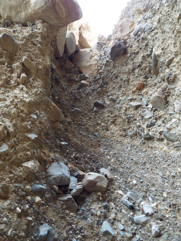 Because the rock was conglomerate, it was way too risky to attempt a climb:
