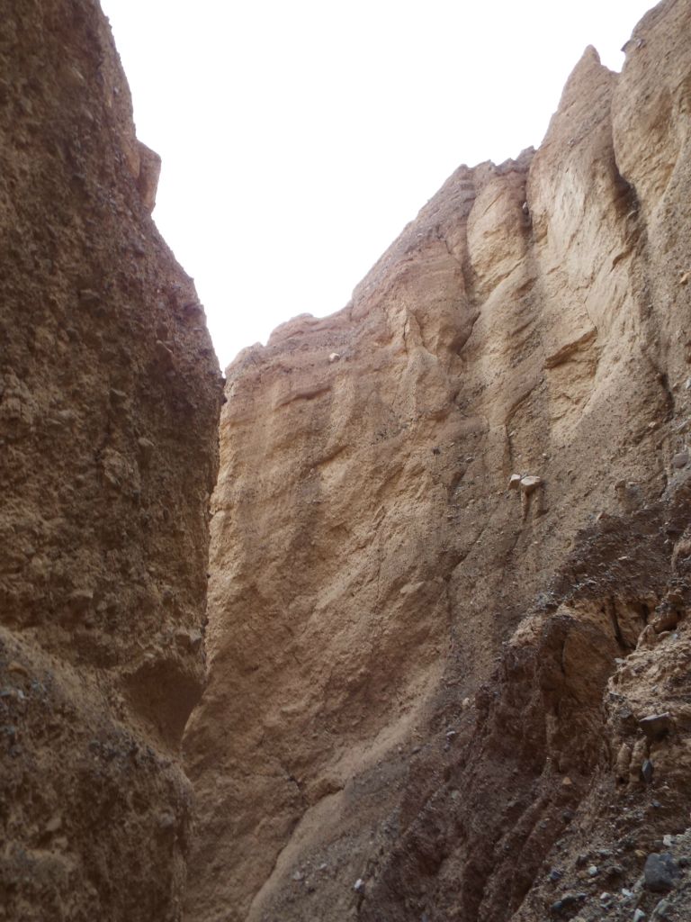 Angling the camera upward to get the top of the walls.  It often wasn't possible to get the wash and canyon rim in the same picture: