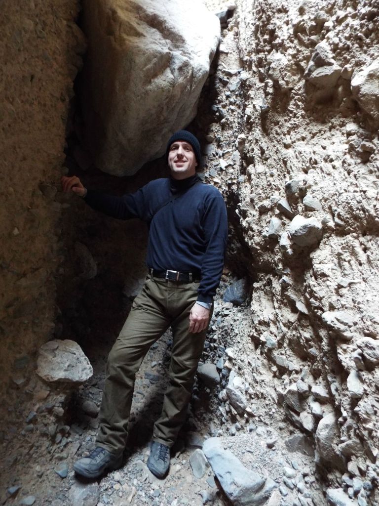 This picture of Tobin shows that the boulder dry fall is about 12 feet high: