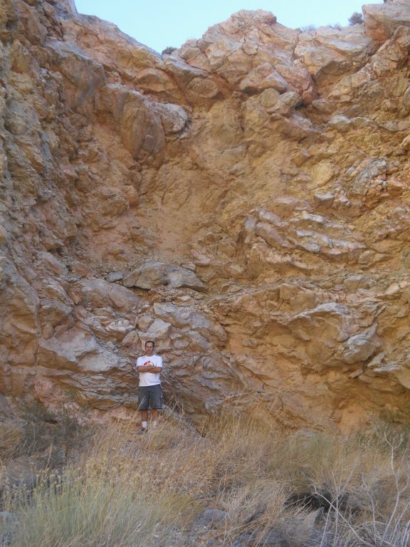 Two pictures of Steve being dwarfed by the only major dry fall in Nova Canyon: