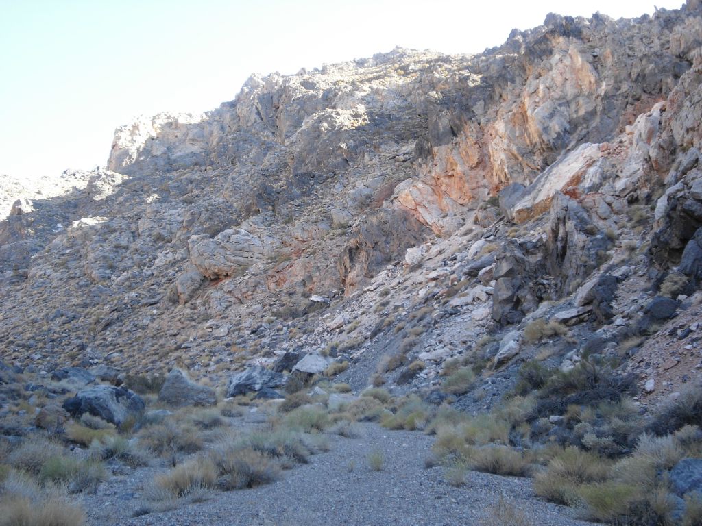 Notice that the rocky hillsides are colorful and full of outcroppings and boulders: