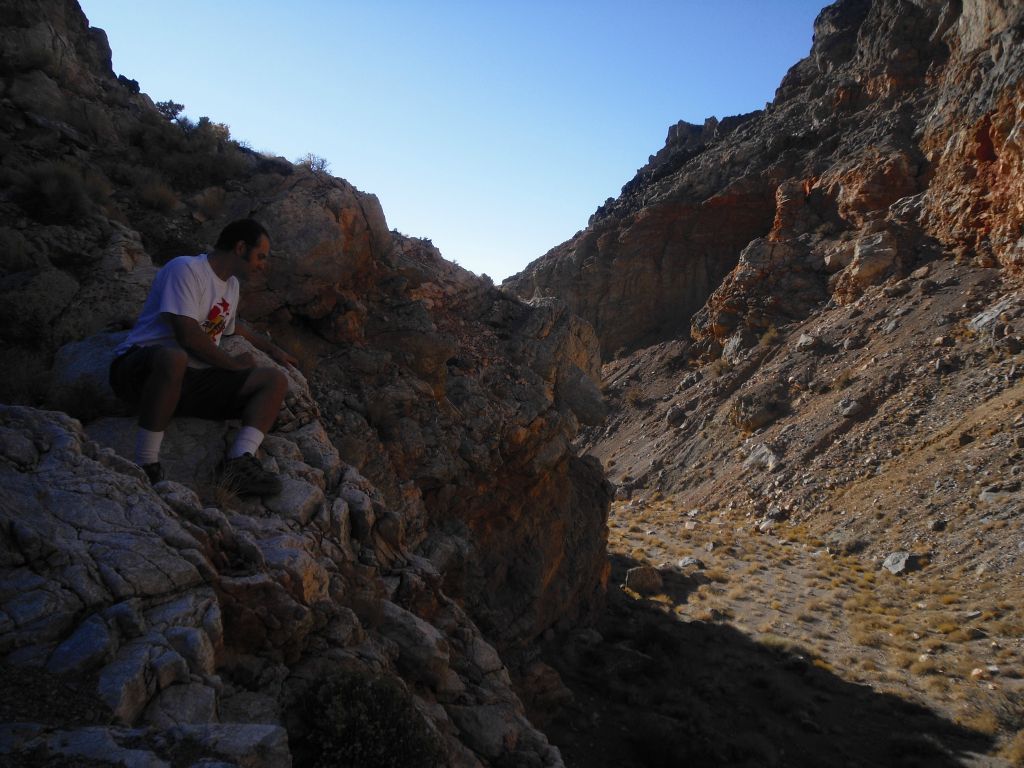 A picture of Steve looking over the edge of Nova Canyon's only major dry fall:
