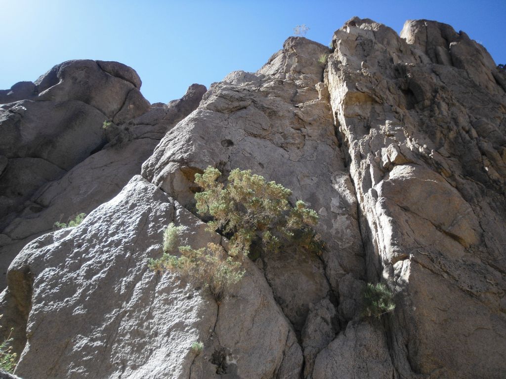 Towering slabs of Owlshead rock above us: