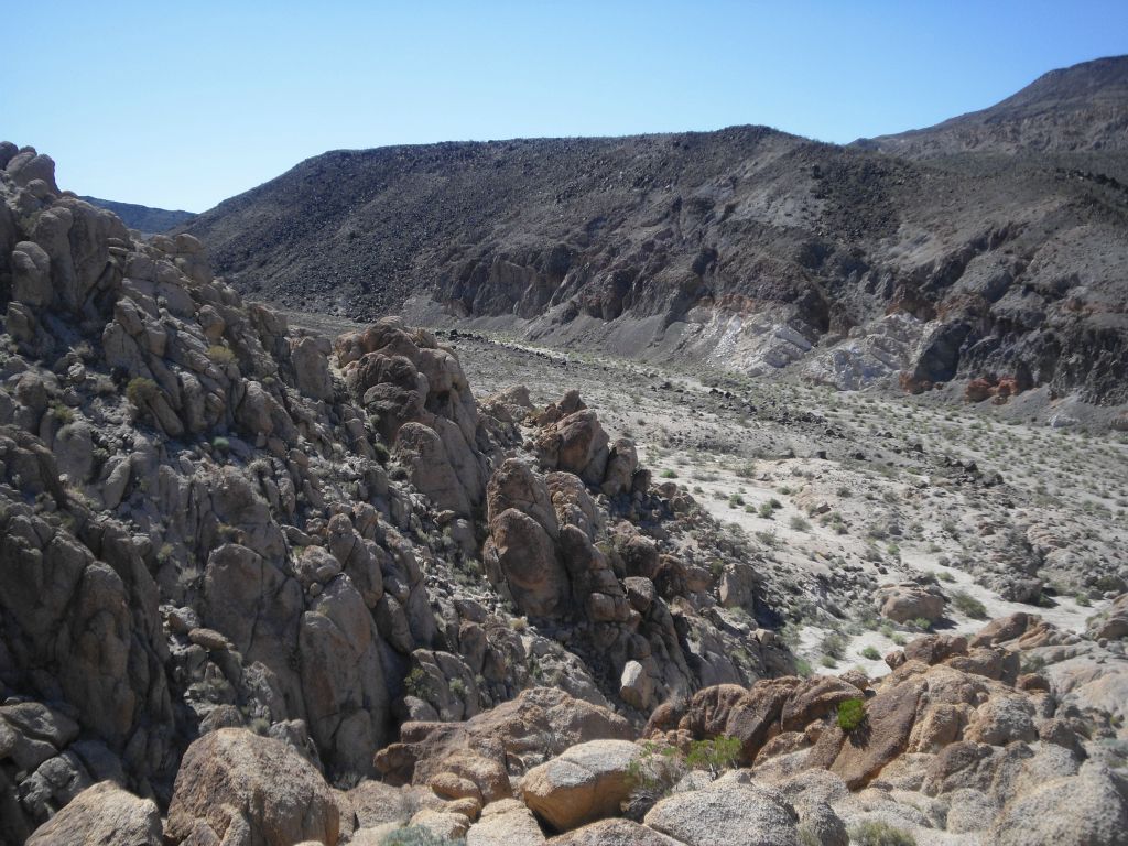 After quite a bit of effort, we reached the ridge of the bypass and could see over the other side as the main canyon continued through a volcanic area:
