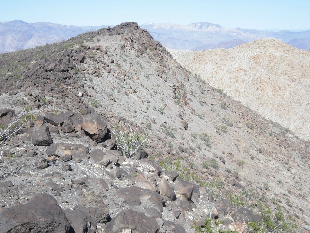Following a volcanic section of the ridge for a short distance: