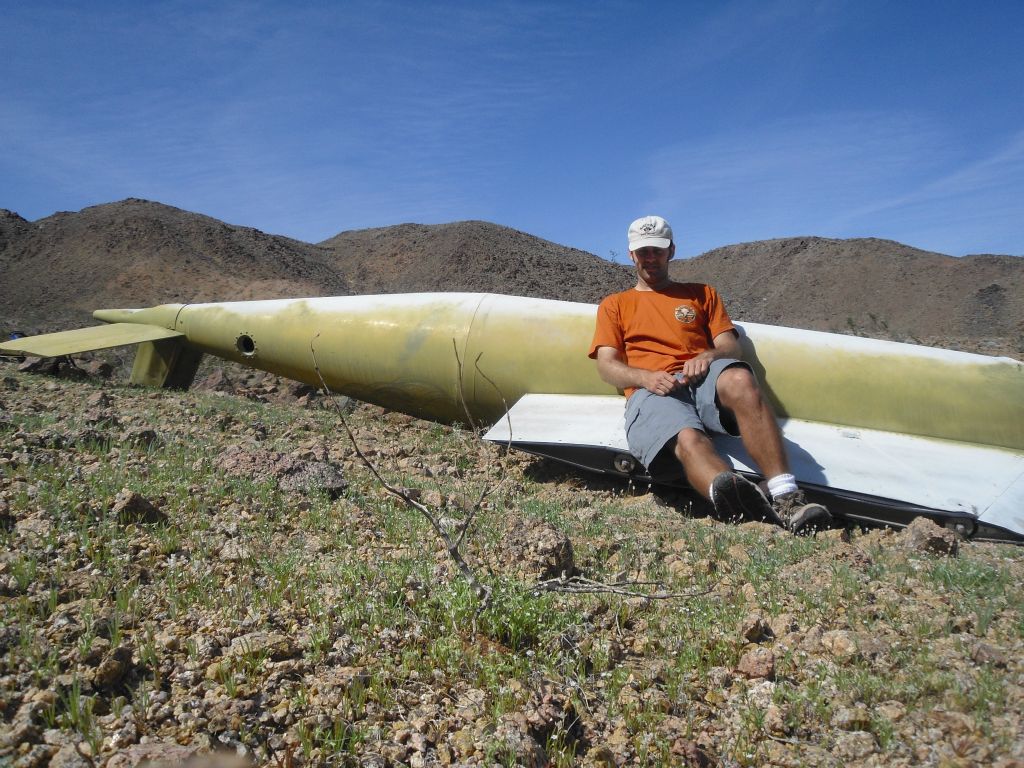 Three pictures of Steve next to the fuel tank which help give some perspective on the size of what's left: