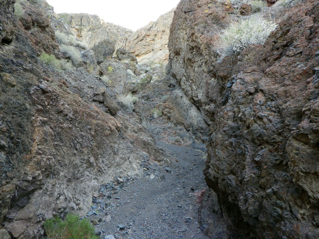 The wash continues to curve back and forth as it climbs deep into the Owlsheads: