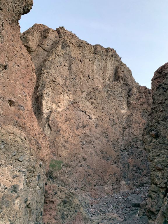 Check out how high this reddish canyon wall reaches: