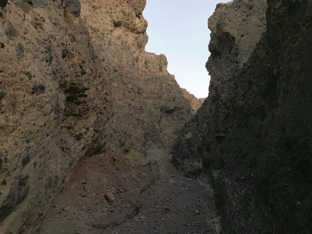 The setting sun was barely having an impact on the canyon walls above: