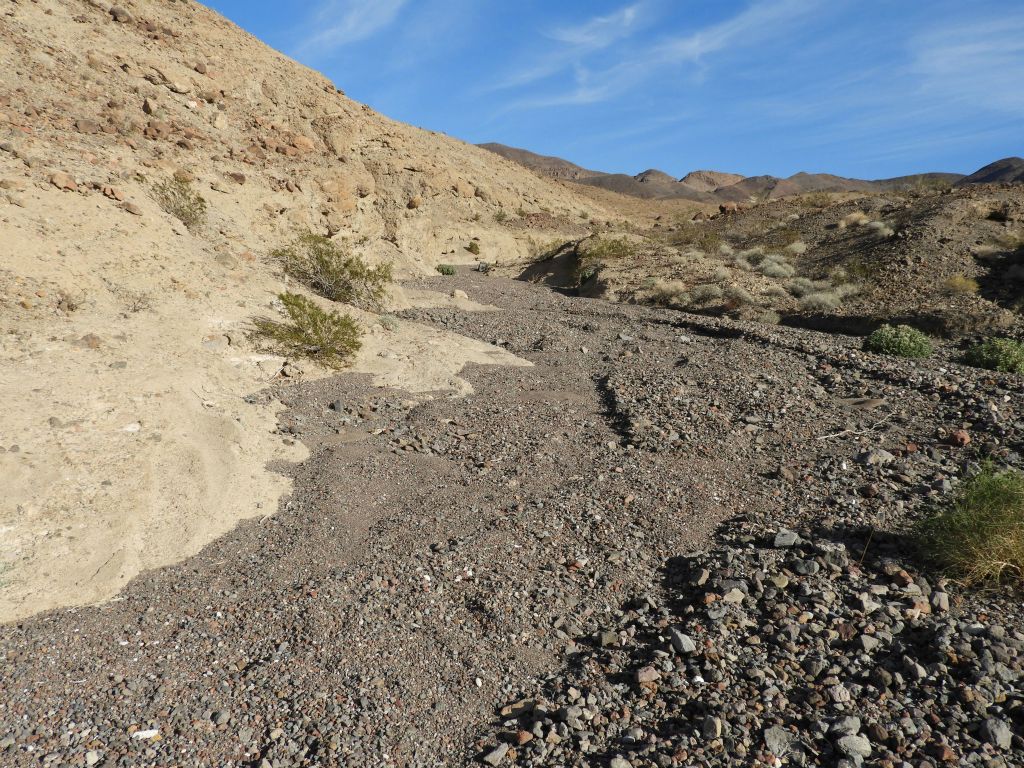 The full NEEC Canyon loop is about 6 1/2 miles in length.  Add to that the 18 miles round-trip just to get to the canyon mouth and you can see why this is nearly impossible to do as a day hike: