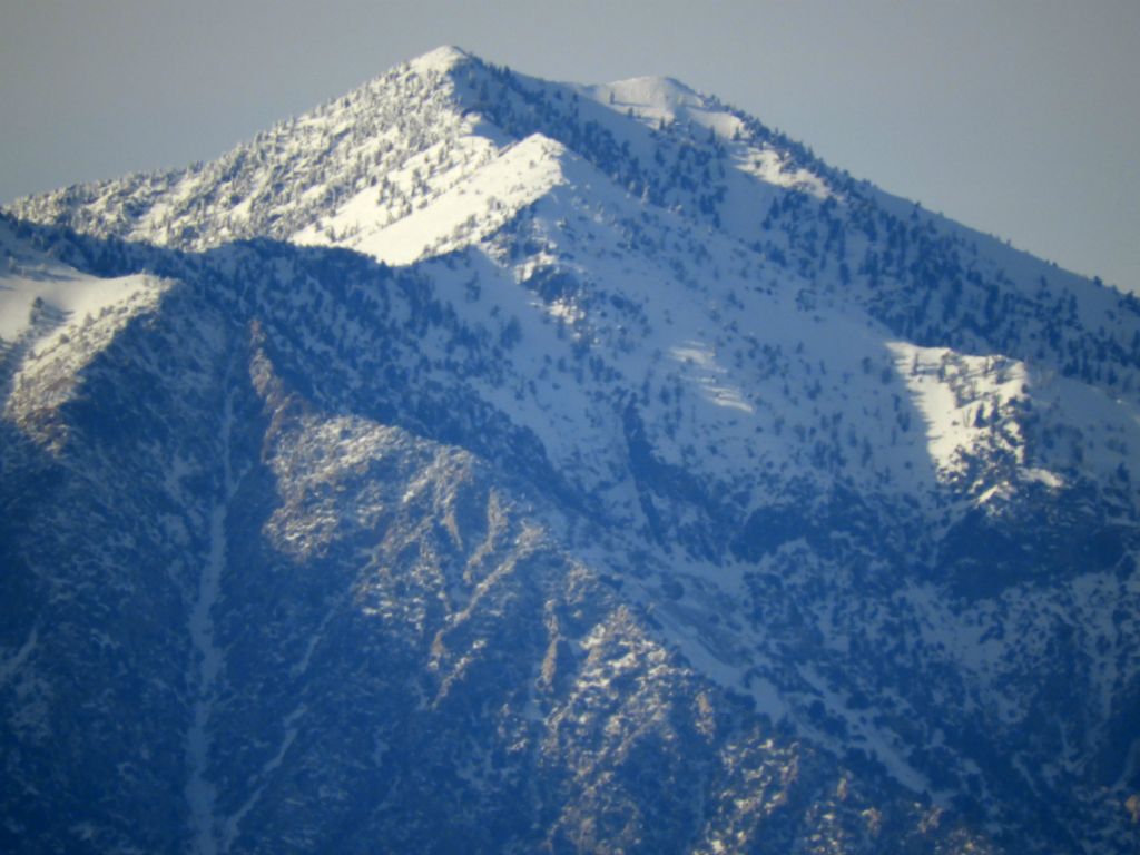 Zooming in on the snow-capped summit of Telescope Peak with afternoon shadows: