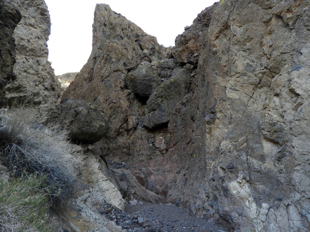 The main canyon stays to the right and passes by this triangular rock outcropping: