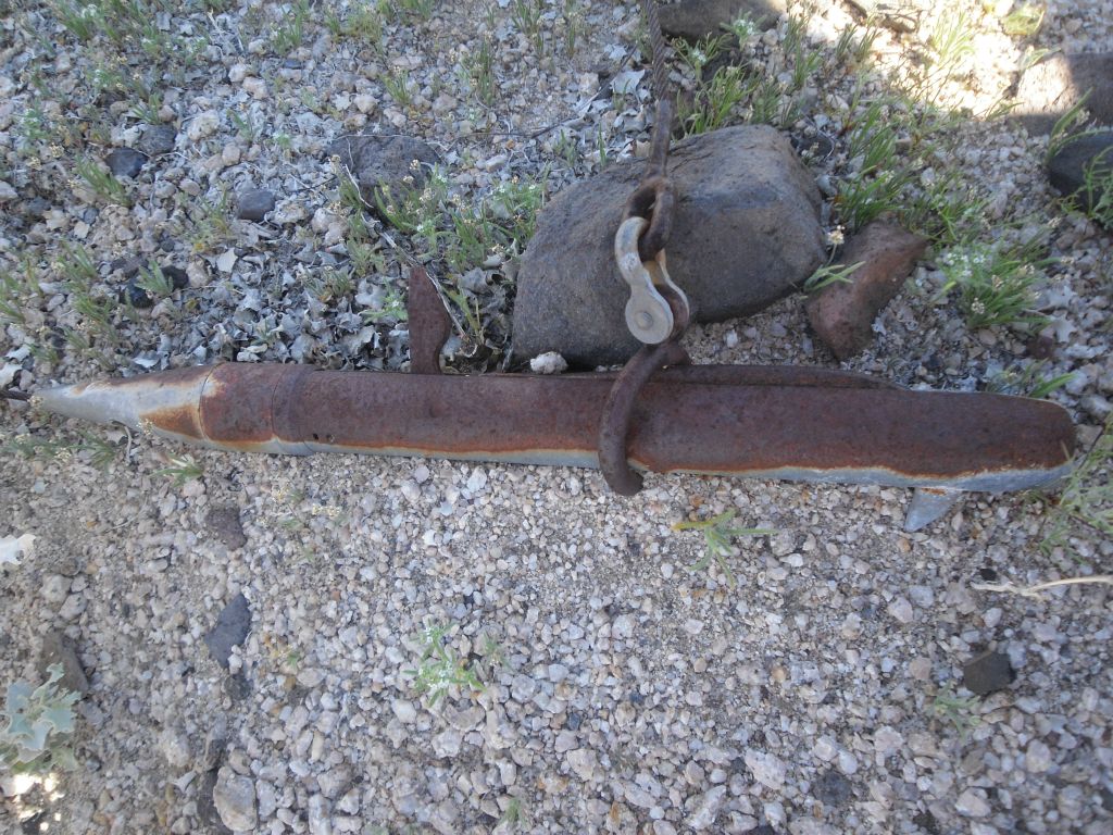 Two pictures of some old contraption that I found laying on the ground.  I have no idea what this was once used for: