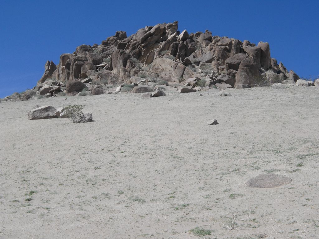 I chose the left fork and followed below the lower dune.  Soon the canyon splits again.  When it does, the key is to continue straight by following below the lower dune and heading straight for the ridge.  This is the view looking up to the right while passing by more of lower dune: