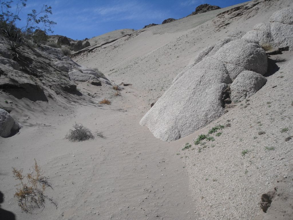 Heading straight up the very small canyon below lower dune.  Notice the thick sand to walk on: