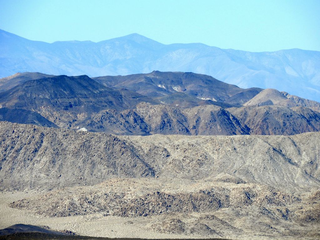 The dark hills seen in the center of the picture form part of the ominous headwall above Talc Canyon (right middle):