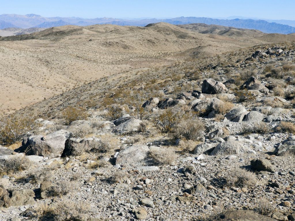 After briefly enjoying the summit views, we headed northeast to begin crossing along the top of the range: