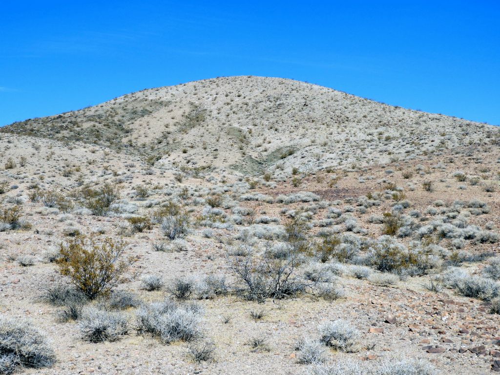 Passing directly below the slopes of peak 966T: