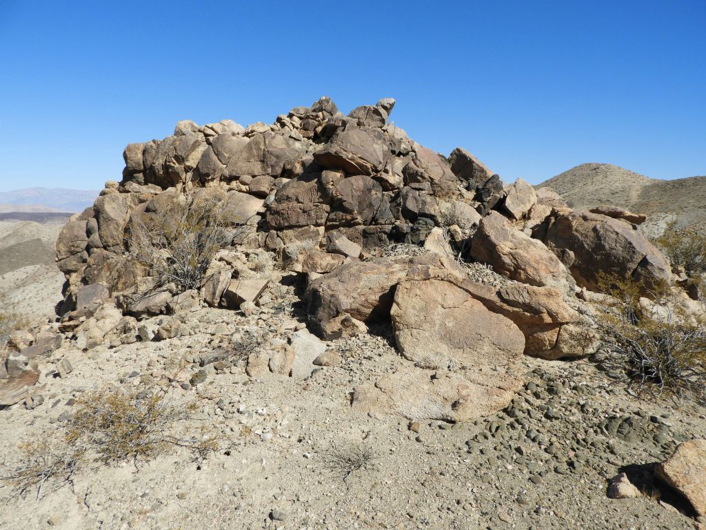 This small rock outcropping is a good target to head toward which confirms you are on the right track: