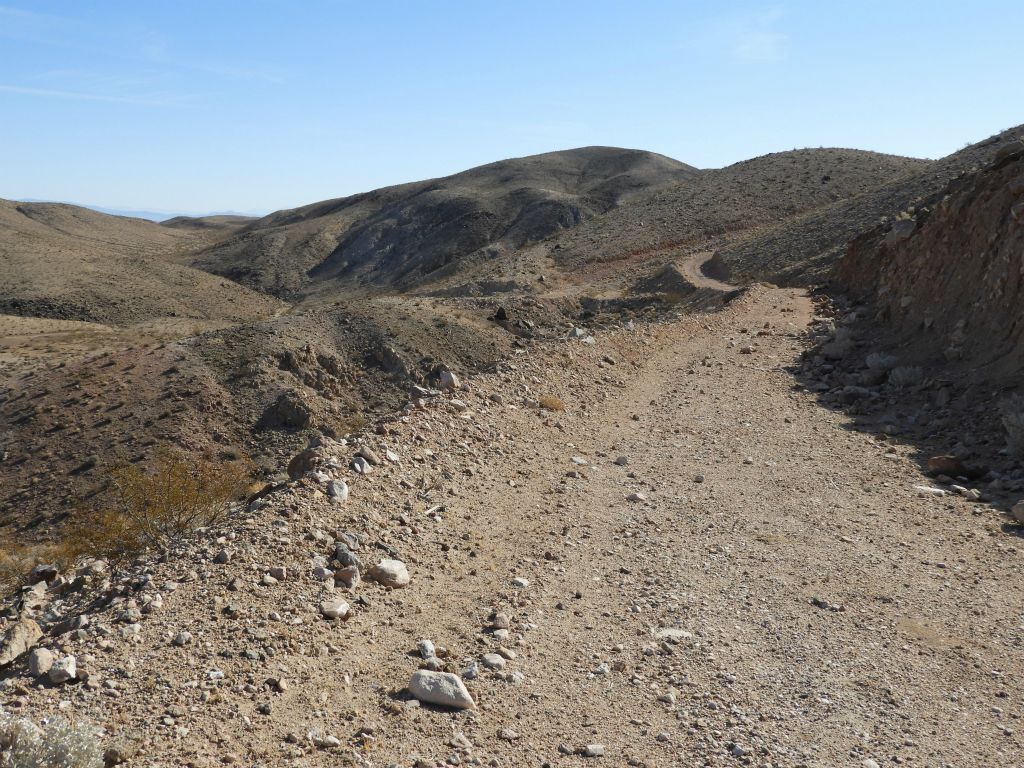 The road soon crests and continues along the top of the range toward Spring BM: