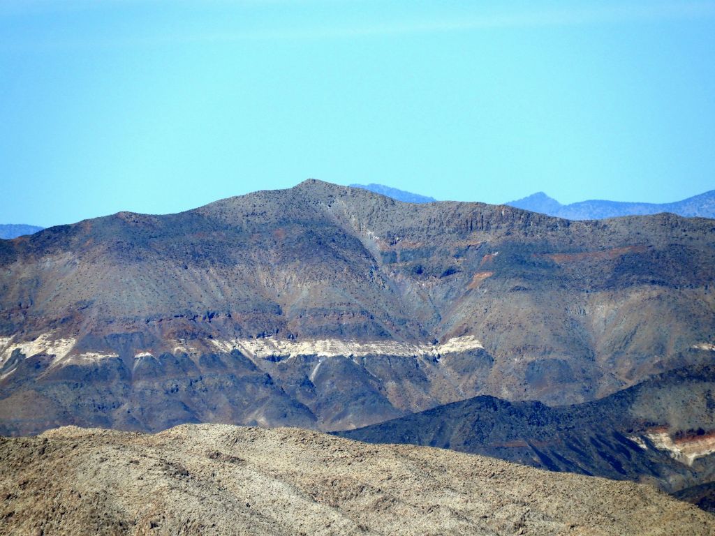The white-banded cliffs of Owlhead BM (4,409 feet) are very distinct and help to easily identify the summit location: