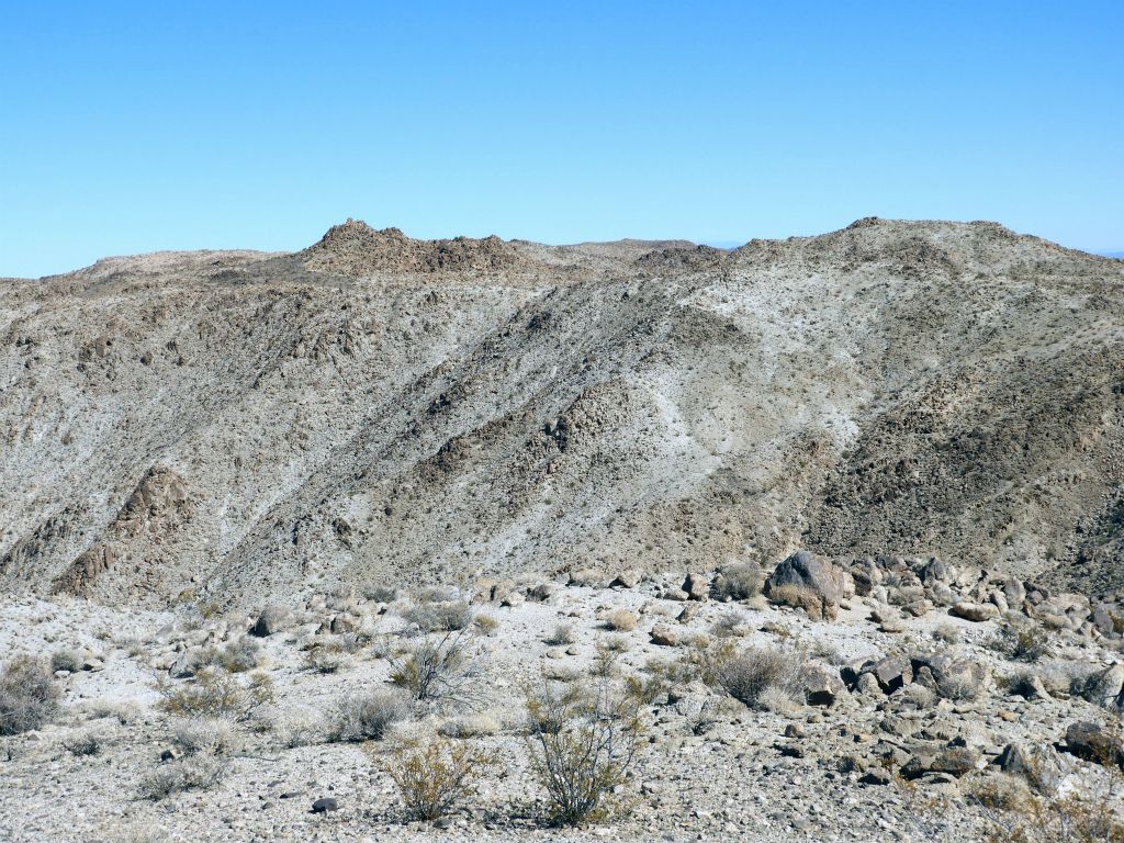 Spotting peak 921T far off in the distance across the cliffs (which we circled around):