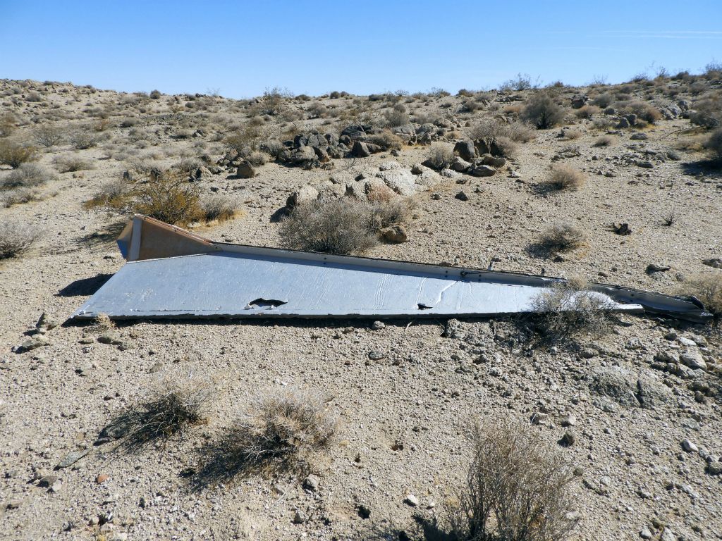 As we circled around the area of cliffs, we found this crashed Dart resting on the ground: