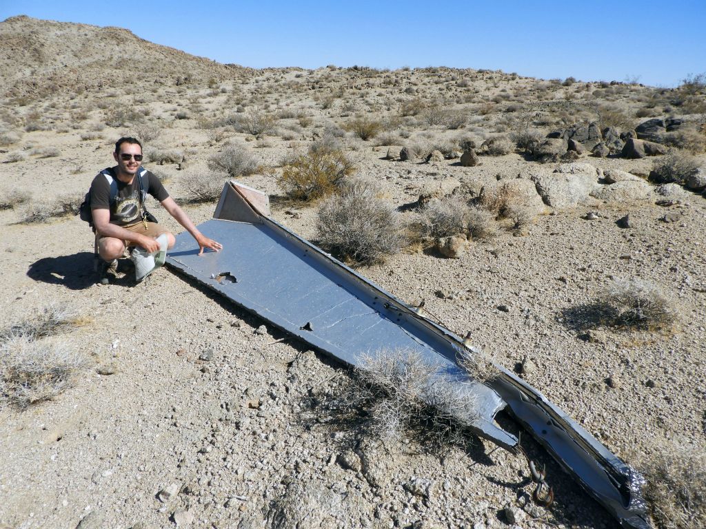 A picture of Lowell with the Dart, which appears to be about 12 feet in length: