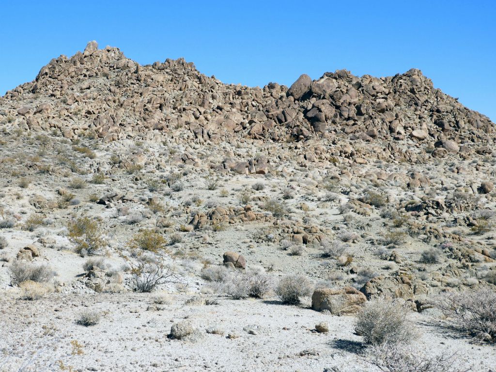 The Castle is a minor peak rising up high made of giant decomposed granite boulders: