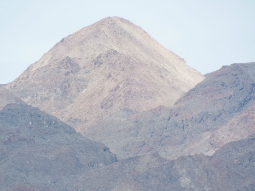 This is the colorful triangular peak to the left of Sugarloaf Peak.  This small peak is only about 70 feet in elevation lower than the summit of Sugarloaf: