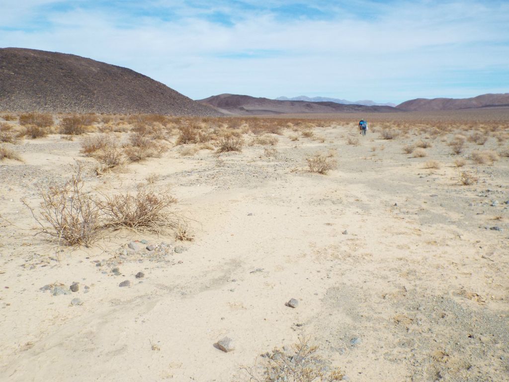 Now hiking in Wingate Wash, we first aimed for the tip of the hillside seen on the left: