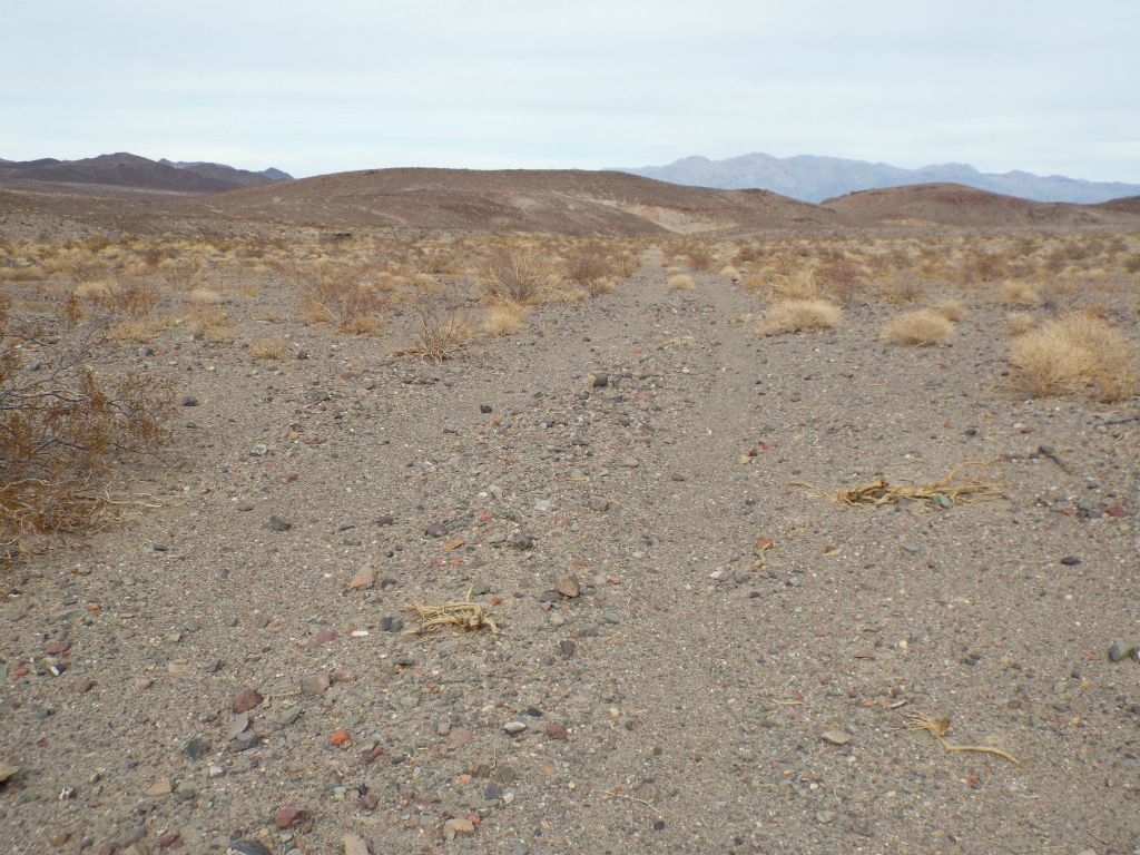 The tracks of the old Wingate Wash Road once again became visible: