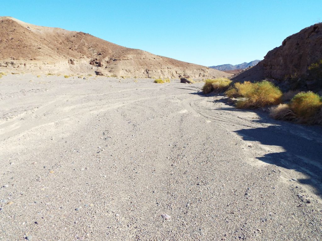 We backpacked down Wingate Wash until we reached the turnoff for Wingate Slots 2 & 3 just past this area, about 1 mile from camp: