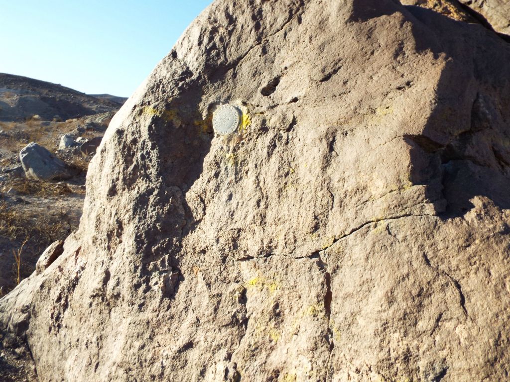The third benchmark of the hike was found on this rock wall above the wash.  There was another benchmark pole in the wash, but the actual 478 Mine elevation benchmark had been stolen from it: