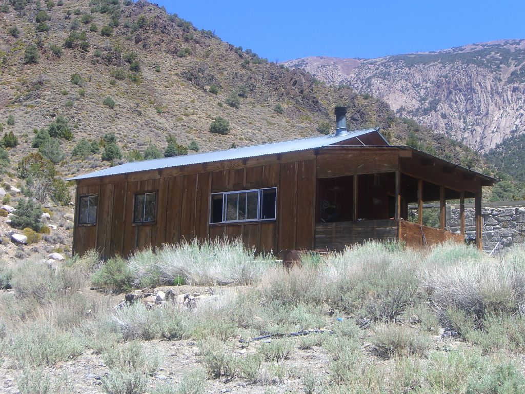 The legendary Panamint Hilton (usually found in conditions varying from great shape to total disrepair) welcomes visitors to Panamint City: